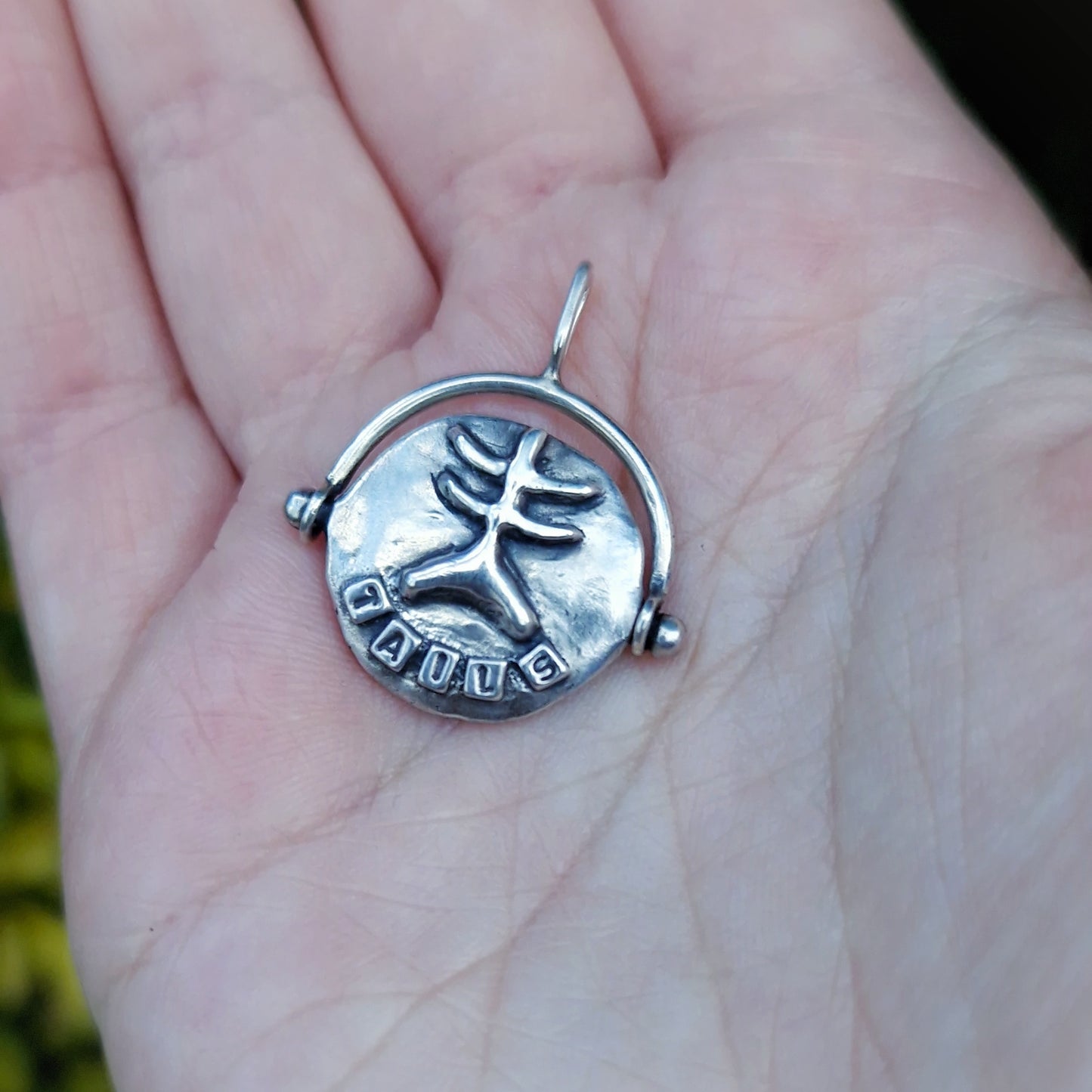 Silver 'Heads or Tails' Fish Bone Spinning Pendant