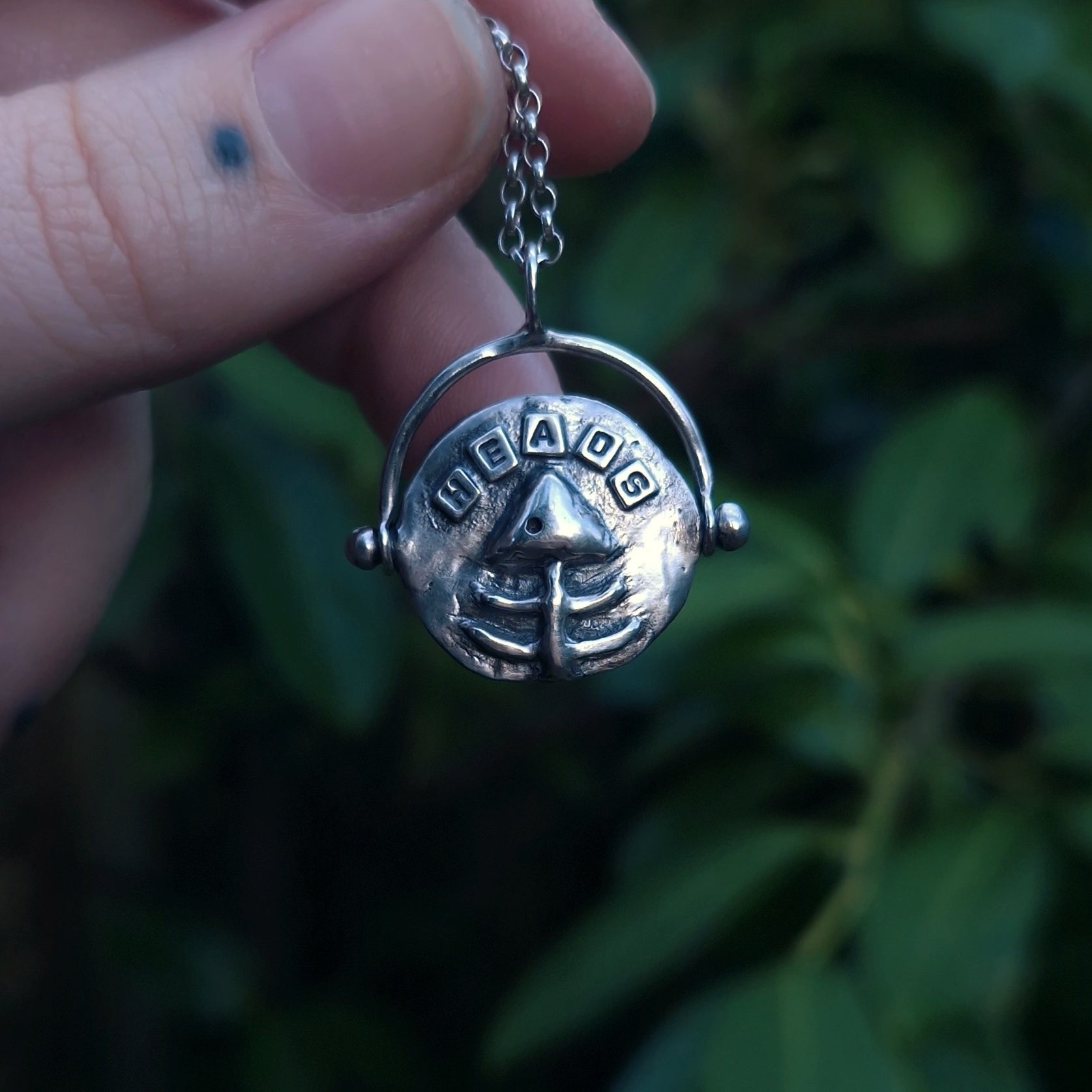 Spinning fidget silver necklace