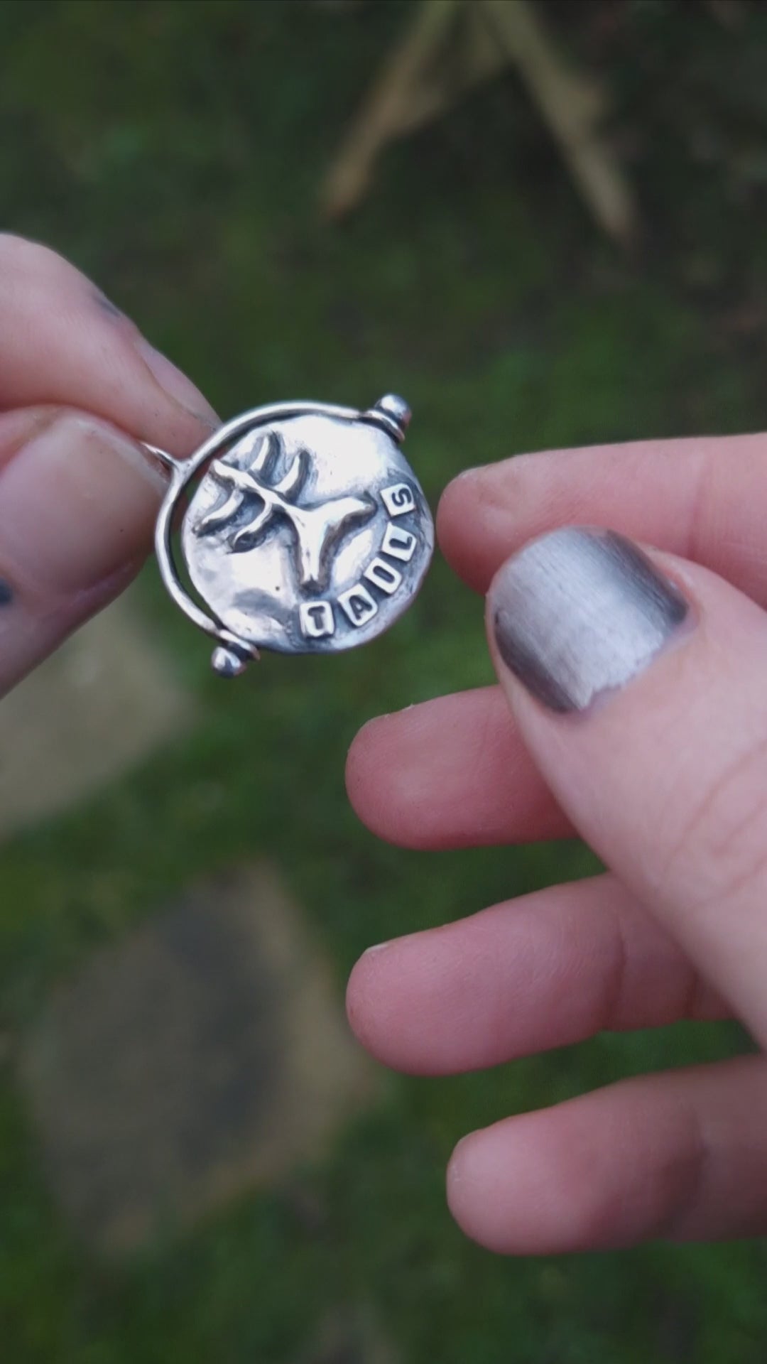 spinning necklace charm